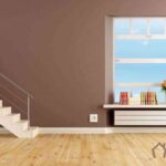 Brown living room with staircase