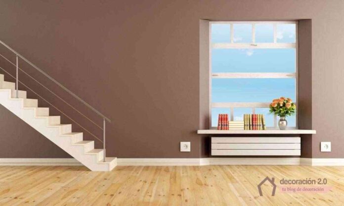 Brown living room with staircase