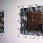 Creatividad espejo con alambres