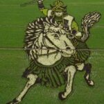 Decorando campos de arroz figura guerrero