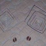 Manualidad espejo con alambres