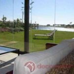 Cerramiento con cortinas de cristal