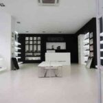 Diseño de una zapatería con líneas limpias y depuradas 11 Decoración zapatería Urbano