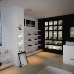 Diseño de una zapatería con líneas limpias y depuradas 4 Diseño de interiores por Sergio Castro