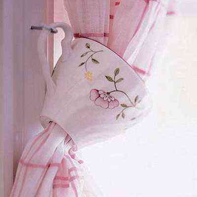 taza de sujetacortinas