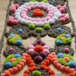 alfombra-con-pompones-1