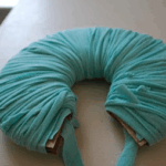 Trapillo enrollado en cartón para hacer pompón