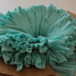 Estado de pompón de trapillo después de cortarlo.