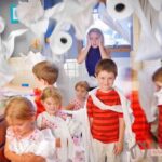 Stress Mother Watching Kids Make a Mess