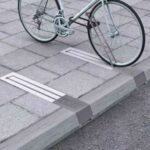 Parkting de Bicicletas original e integrado en aceras
