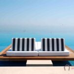 Infinity swimming pool by beach at the modern luxury hotel, Pieria, Greece