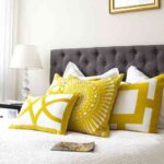 decorar-con-cojines-cama-elegante-1