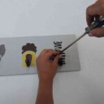 perchero-atornillando-ganchos-1