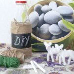 botella final con piedras