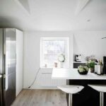 Ático de estilo nórdico entrada a cocina 1200×899