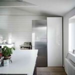 Ático de estilo nórdico vista salida de cocina 1200×899