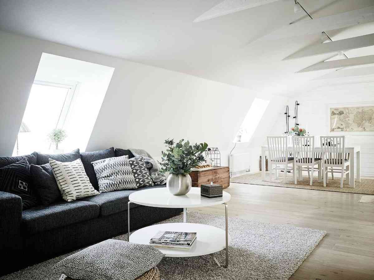 Visita a un ático de estilo nórdico ¡del que no querrás salir! 8 Ático de estilo nórdico zona salón comedor 1200x899