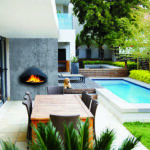Modern patio next to swimming pool