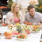 Family Enjoying A Barbeque