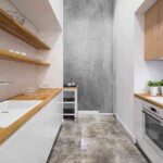 White kitchen with wooden countertop
