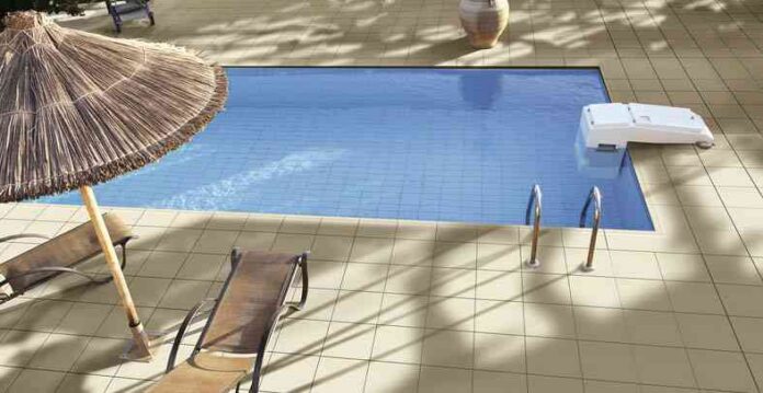 Swimming pool with deckchairs