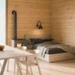 Render Image of a small log cabin interior.