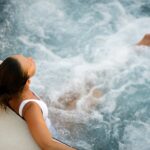 attractive woman relaxing in a whirlpool hot tub
