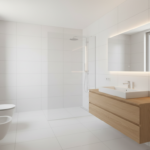 A bright minimalist bathroom with clean lines, suspended white sanitary fittings, large format white