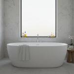 A luxurious modern bathroom with a sleek vertical chrome heated towel shelf standing next to a white