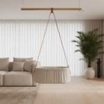 A modern minimalist living room with a ceiling-mounted hanging bassinet suspended by a single leathe
