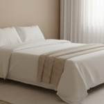 A serene modern bedroom with a neatly made bed featuring two white memory foam pillows on crisp whit