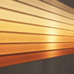 Close-up macro detail of a modern LED backlit wall panel simulating a sunrise scene, showing individ