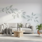 Modern living room with a large decorative vinyl wall decal featuring botanical leaf patterns on a w