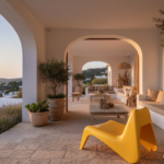 Modern outdoor terrace in a Mediterranean home with a yellow thermoplastic low designer armchair, po
