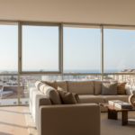 Photorealistic architectural photography of a modern apartment living room with large floor-to-ceili