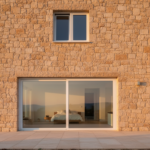 Photorealistic exterior photograph of a contemporary residential building facade showing different t