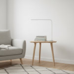 Scandinavian style bedroom corner with a minimalist triangular bedside table in light birch wood, a