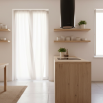 Scandinavian style kitchen with sleek black extractor hood over induction cooktop, open sliding wind