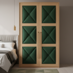 Wooden wardrobe with upholstered fabric panels on the doors, tufted velvet green fabric on light woo