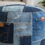 Close-up detail shot of a handmade patchwork pouf made from recycled denim jeans, showing different