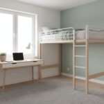 Bright modern teenager bedroom with a loft bed, study desk beneath near window with natural light, w