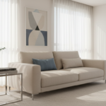 A modern, bright living room showcasing a glass and aluminum side table next to a stylish sofa. The