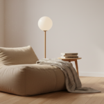A cozy modern living room with a large bean bag puf in earthy beige tones placed next to a wooden fl