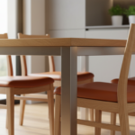 Detailed close-up of an elegant kitchen table with oak wood top and steel frame, paired with beech w