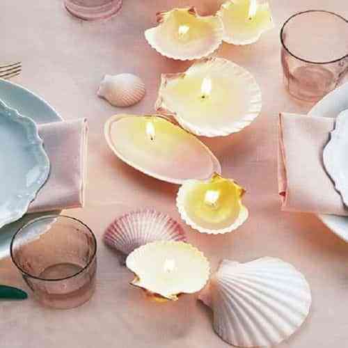 Realiza unas velas decorativas con conchas de caracoles