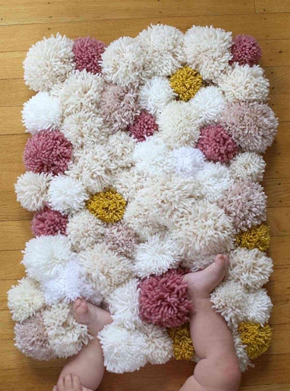 alfombra de pompones